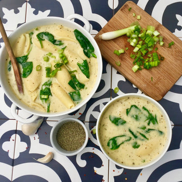 Alfredo Shell Soup: Rich, creamy, silky, delicate white version of robust Italian tomato based sauce. Tender pasta simmered in broth sauce, delicately spiced with aromatic herbs, beans and spinach with velvety cashew cream, is comforting yet elegant dinner. 