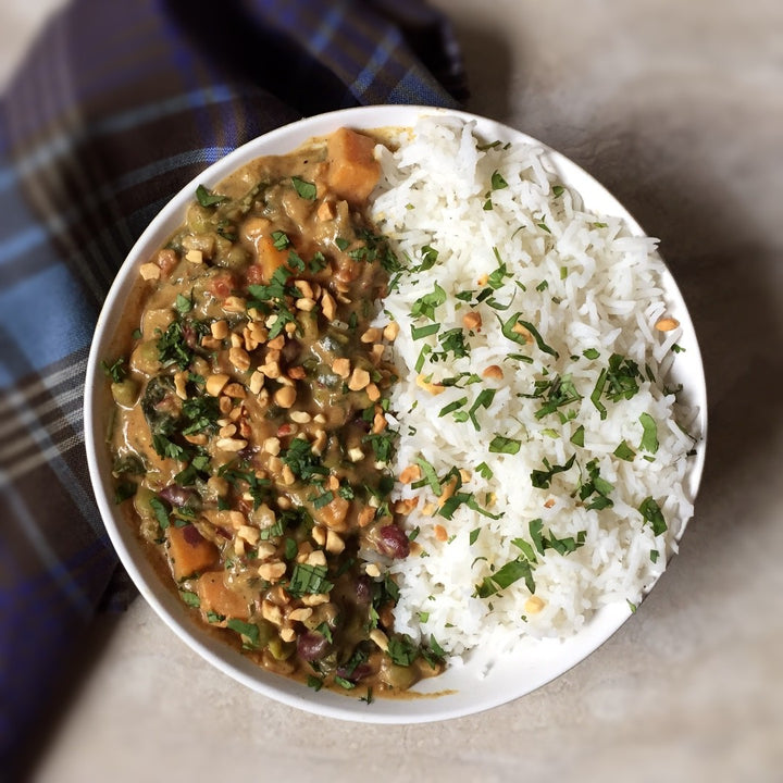 African Peanut Stew A hearty, lightly spicy, earthy, delicious, protein loaded and all time favorite peanut African Stew. Sweet potatoes, carrots, celery, and green peas simmered in tomato peanut-butter sauce, with splash of coconut milk, served over basmati rice.