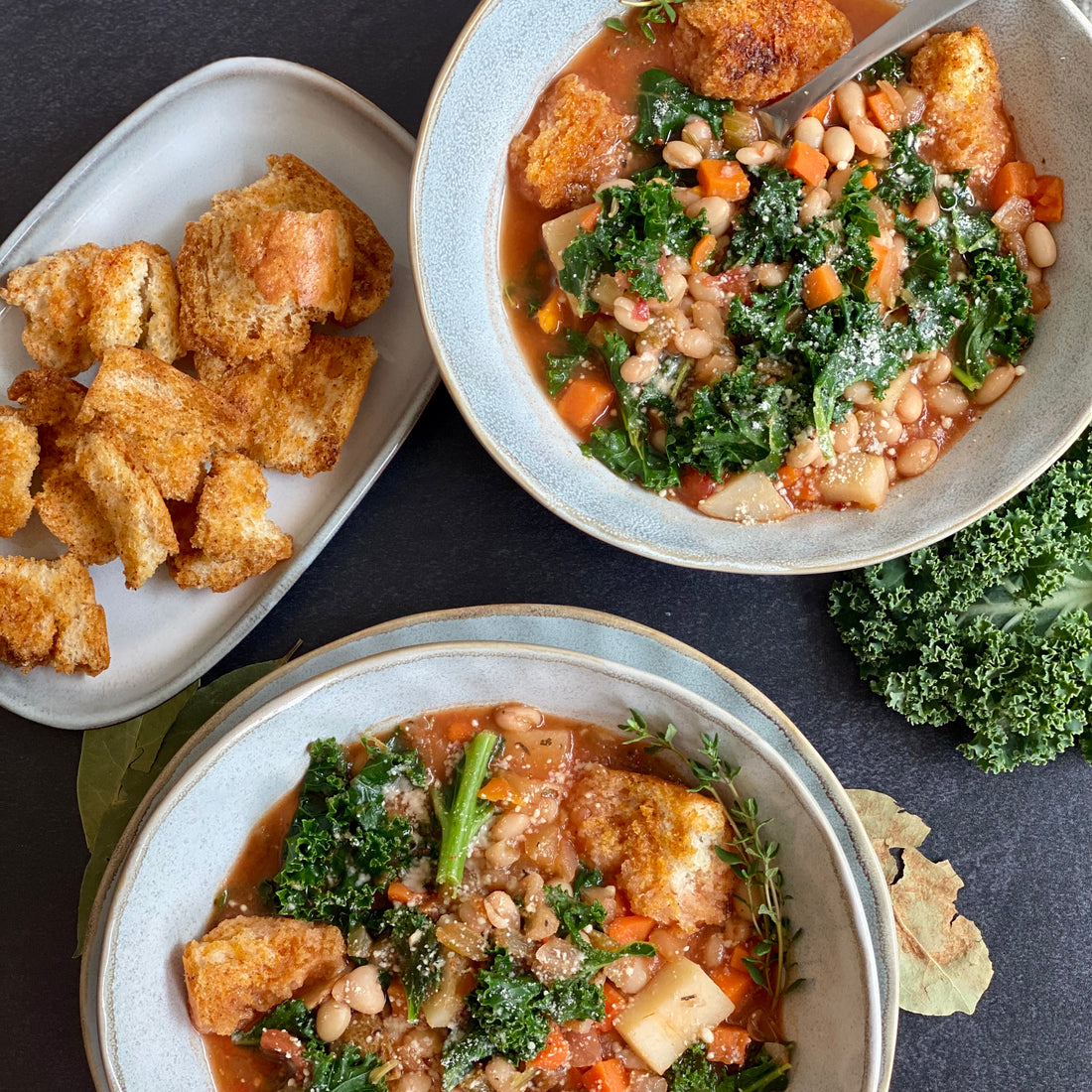 Tuscan Ribollita Healthy Italian inspired soup packed with seasonal vegetables, protein rich beans, nutritious greens simmered in rich herb- tomato broth, served with warm  bread croutons is the ultimate bowl of comfort food.